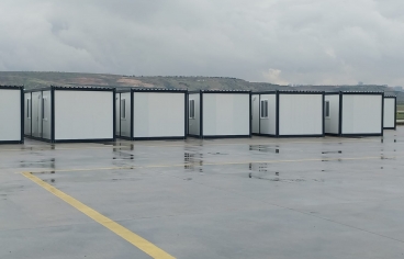 SHELTER AND LIVING CONTAINER